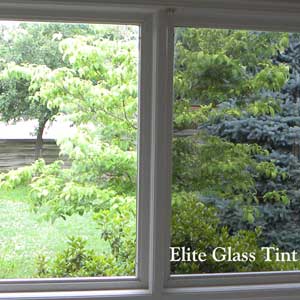 High performance dual reflective glass tinting to reduce heat and make homes more efficient